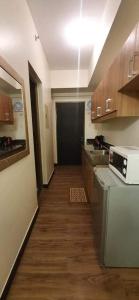 Η κουζίνα ή μικρή κουζίνα στο JCGA Apartments at Bristle Ridge Condominium Near Botanical Garden and The Mansion +3 φωτογραφίες