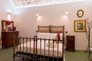 Posteľ alebo postele v izbe v ubytovaní Luxury Duomo Suite by Ortigiaapartments