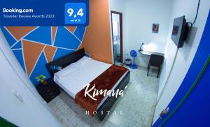 Postel nebo postele na pokoji v ubytování Kimaná Hostal