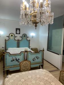 Un pat sau paturi într-o cameră la appartamento perugia