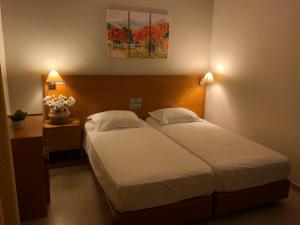 Posteľ alebo postele v izbe v ubytovaní Philippos Studios & Apartments