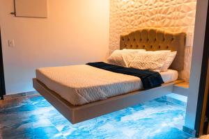 Postel nebo postele na pokoji v ubytování Hotel Salinero - Zipaquirá