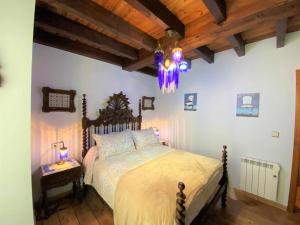 Tempat tidur dalam kamar di Casa Las Hortensias Quintana