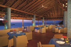 A restaurant or other place to eat at Secrets Huatulco Resort & Spa