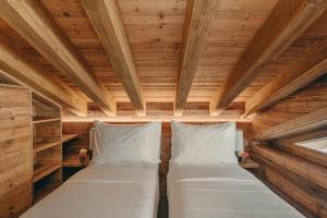 Voodi või voodid majutusasutuse Eringer Hotel toas