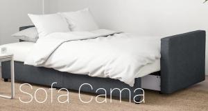 A bed or beds in a room at Apartamento Arenal II