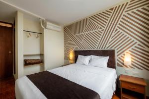Krevet ili kreveti u jedinici u okviru objekta Hotel Rio Blanco