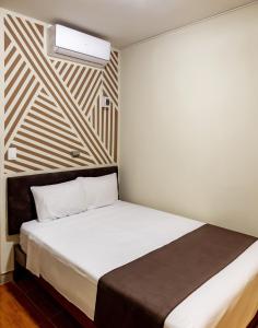 Krevet ili kreveti u jedinici u okviru objekta Hotel Rio Blanco