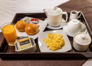 a tray of breakfast food on a table at Hotel Rio Blanco in Piura