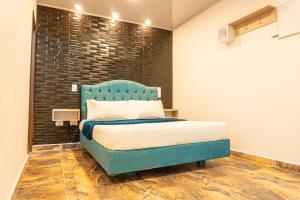 Postel nebo postele na pokoji v ubytování Hotel Salinero - Zipaquirá