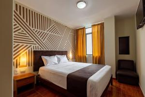 Krevet ili kreveti u jedinici u okviru objekta Hotel Rio Blanco