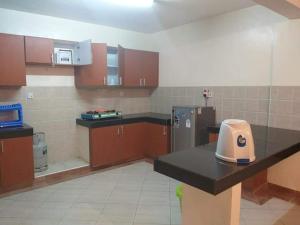 Кухня или кухненски бокс в Mtwapa Beach front villas and apartments