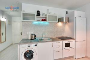 Kuchyň nebo kuchyňský kout v ubytování Vivienda Vacacional Sea Garden