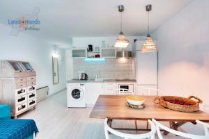 Kuchyň nebo kuchyňský kout v ubytování Vivienda Vacacional Sea Garden