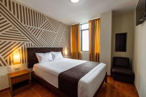 Krevet ili kreveti u jedinici u okviru objekta Hotel Rio Blanco