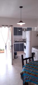 A kitchen or kitchenette at Paula departamento