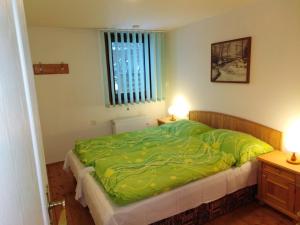 Posteľ alebo postele v izbe v ubytovaní Apartmány Šmika