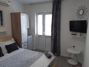 Posteľ alebo postele v izbe v ubytovaní Guest House Sonja