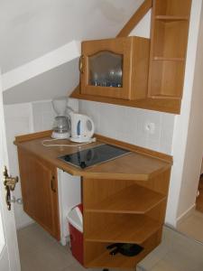 Kuchyňa alebo kuchynka v ubytovaní Apartmány Šmika