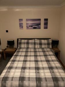 Cama ou camas em um quarto em Carland Cross