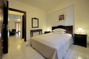 Postel nebo postele na pokoji v ubytování Dianthos Guesthouse