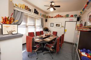 a dining room with a table and chairs at Ray's Bucktown Bed and Breakfast in Chicago