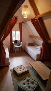 Giường trong phòng chung tại Surf Hostel Quiberon