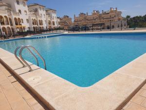 Bazén v ubytování Sunlight Apartment - Molino Blanco - La Zenia nebo v jeho okolí