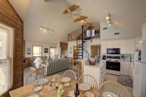 a kitchen and living room with a table and chairs at Chillicothe in Salvo