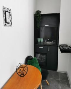 Kuchyň nebo kuchyňský kout v ubytování My Place Apartmani