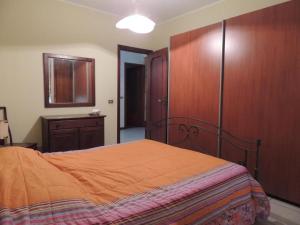 Кровать или кровати в номере Perla sul mare