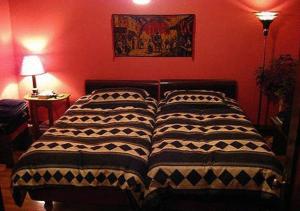 Ένα ή περισσότερα κρεβάτια σε δωμάτιο στο Aux Années Folles