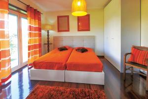 A bed or beds in a room at Villa Isabella Esposende Costa Verde