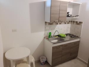 Dapur atau dapur kecil di El Hogar de Ami