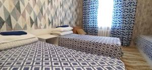 Cama o camas de una habitación en Rent Rooms Barracuda