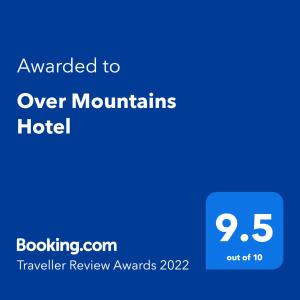 een blauw bord dat is toegekend aan over bergen hotel bij Over Mountains Hotel in Wadi Musa