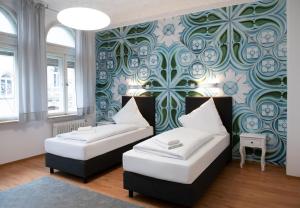 Katil atau katil-katil dalam bilik di Aparthotel Villa Elon