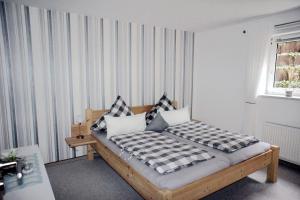 Postel nebo postele na pokoji v ubytování Haus Wyden