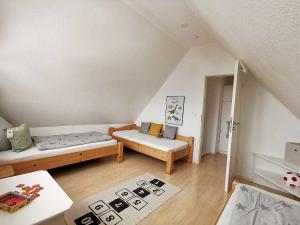 Postel nebo postele na pokoji v ubytování Haus Wyden