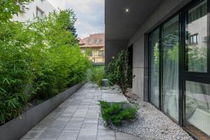 Κήπος έξω από το Aparthotel Blend City Center