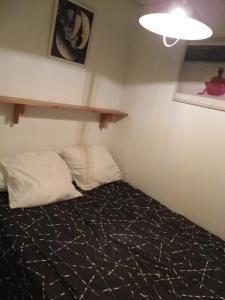 Кровать или кровати в номере Résidence de L'YSE Bat C tarif spécial cure 21 J