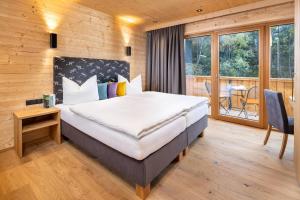 Postel nebo postele na pokoji v ubytování Chalet Stuibenfall Niederthai
