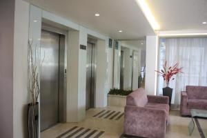Posezení v ubytování Orbett Hotel