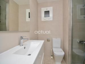 a bathroom with a white sink and a toilet at Elypalace 16 -2 in Platja  d'Aro +42 photos