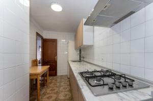 Kjøkken eller kjøkkenkrok på Malaga downtown and beach apartment