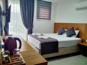 AdaHan Family Rooms Gocek客房内的一张或多张床位