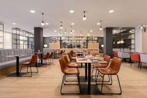 A restaurant or other place to eat at Ramada by Wyndham Valencia Almussafes