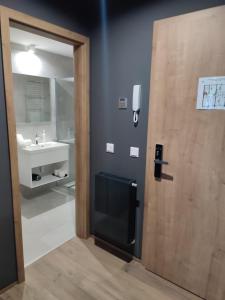 Kúpeľňa v ubytovaní OPÁL Residence Apartman