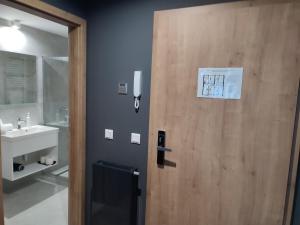 Kúpeľňa v ubytovaní OPÁL Residence Apartman