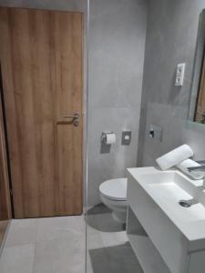 Kúpeľňa v ubytovaní OPÁL Residence Apartman